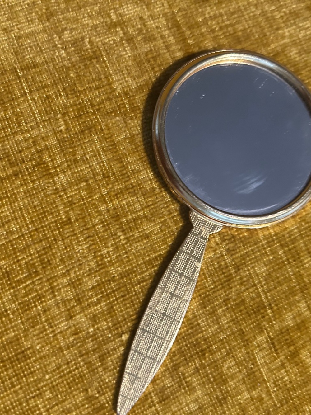 Gold filigree hand mirror